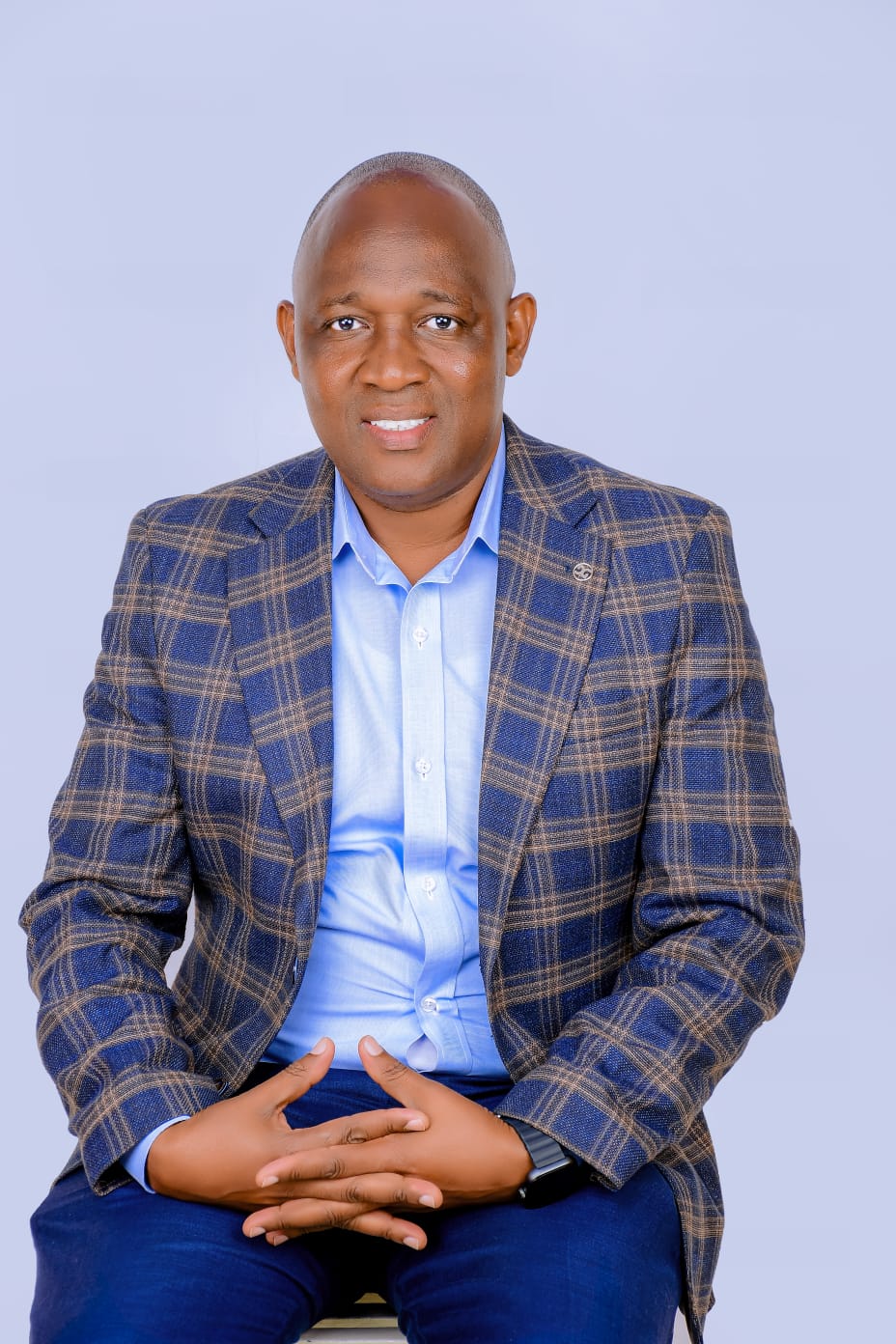 Portrait of Job Machini, Founder of BimaOneStop Centre